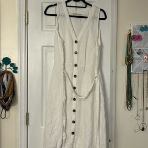 White summertime linen dress with functional buttons